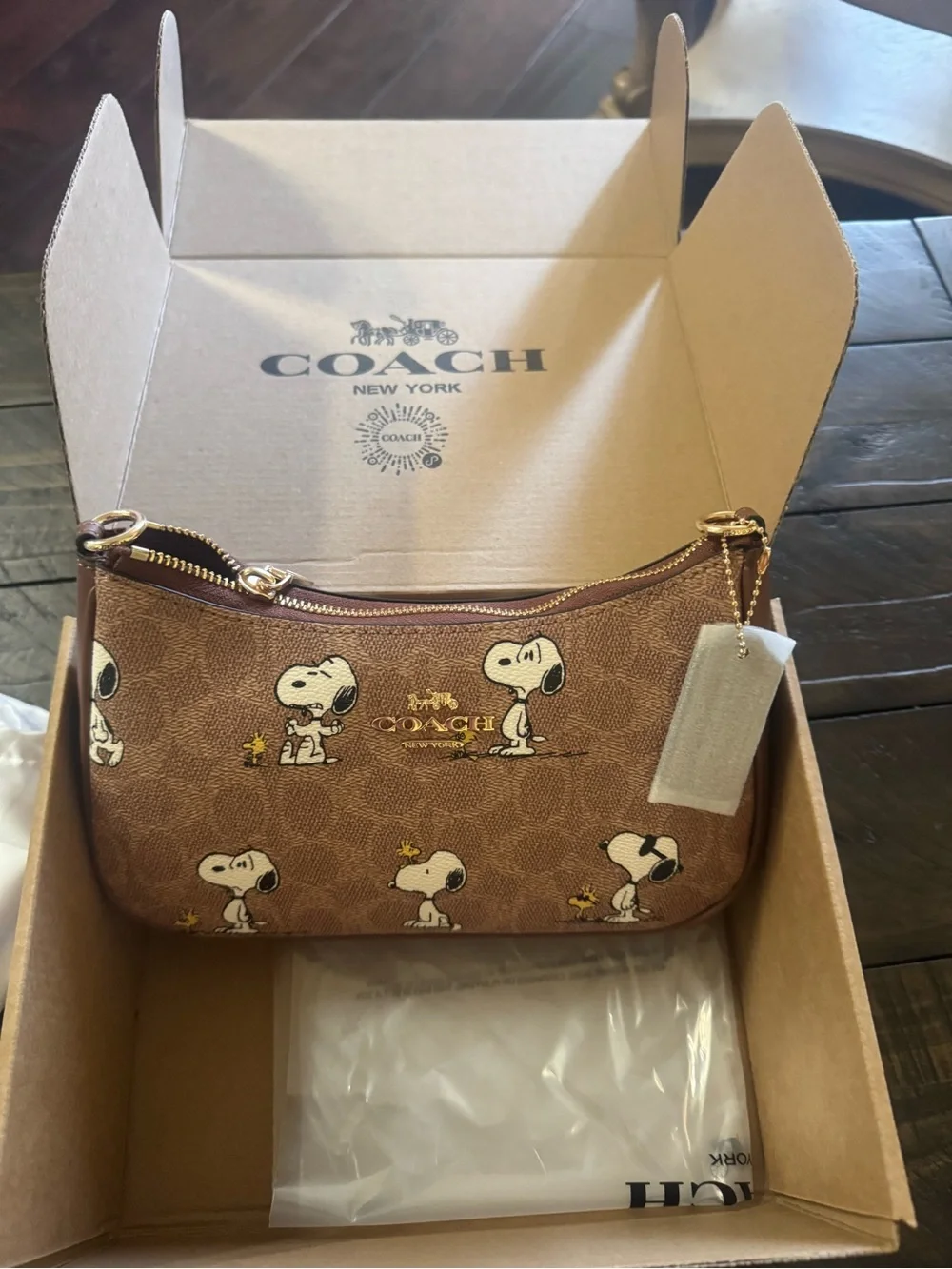 Coach Brown Snoopy Print Mini Wristlet